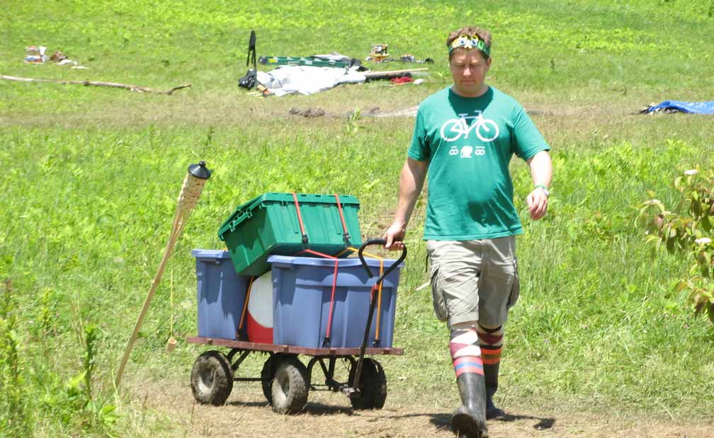 pretzel2009A A Firefly pulls a cart loaded with storage bins.